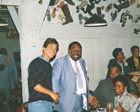 w/ Floyd Dixon at Footies (note hanging shoes), Pasadena, CA. c.1986